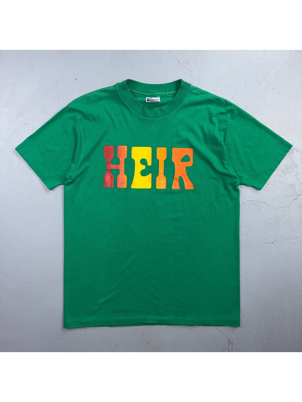 Heir 1980s VTG T Shirt Green Graphic Music Band Text Single Stitch 80s Hanes